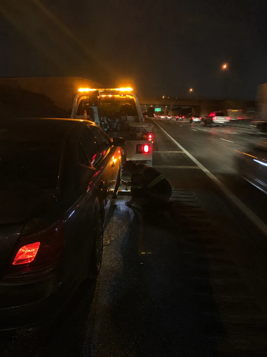 24 hour towing for a broken-down car on the freeway shoulder near Humble